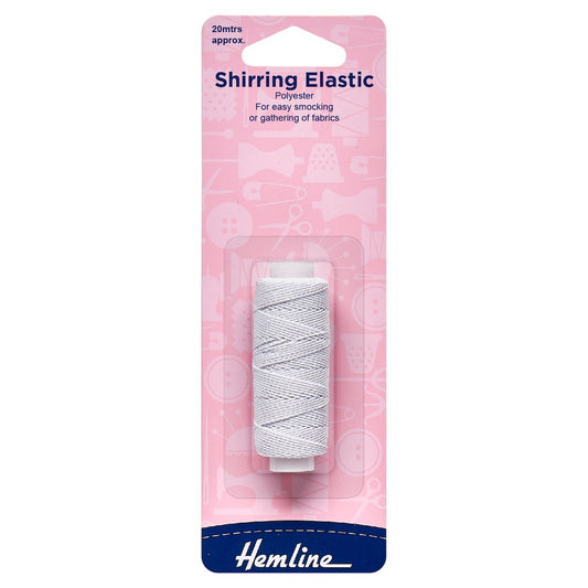 Packaging of Hemline Shirring Elastic, primarily white in color, with a length of 20 meters, designed for easy smocking.