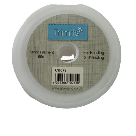 A spool of Trimits white mono filament for beading and threading, 69 Metres in length, with a label that includes the brand name and product details.